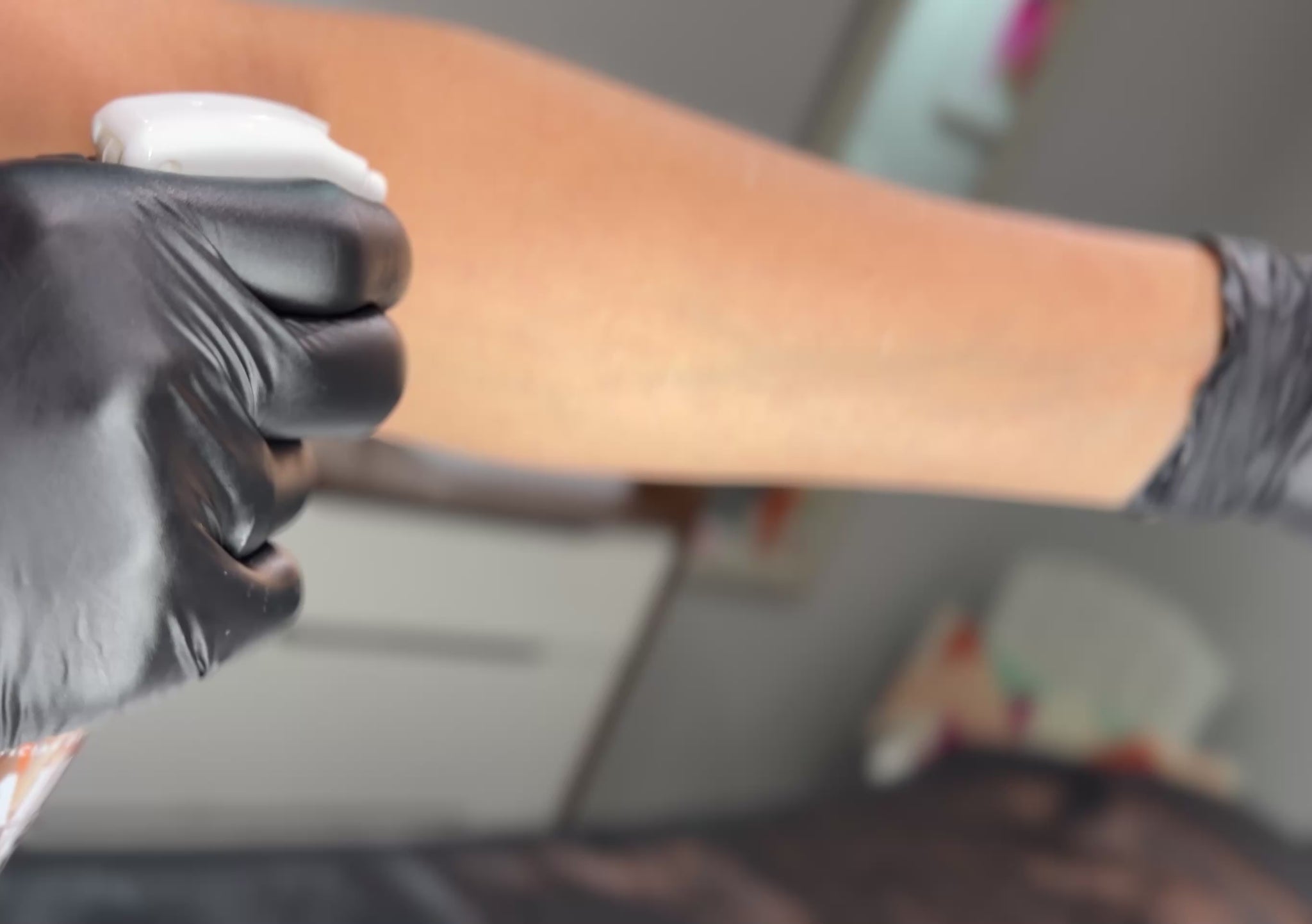Applying Phoryor All Over Oil to body skin