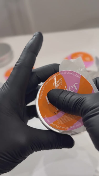 Esthetician answering a client question about Phoryor Barrier Balm